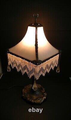 Art Deco vintage lamp with bent opalescent slag glass and glass bead fringe