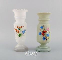Four antique vases in hand-painted mouth-blown opal art glass. Approx. 1900